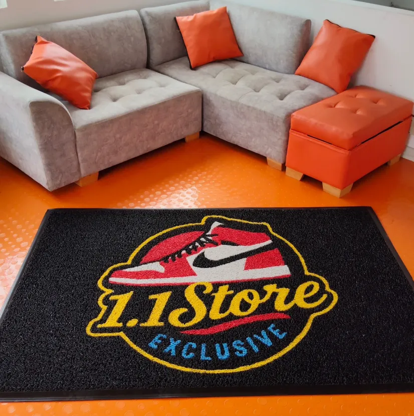 Custom branded entrance mat at a store in Aruba