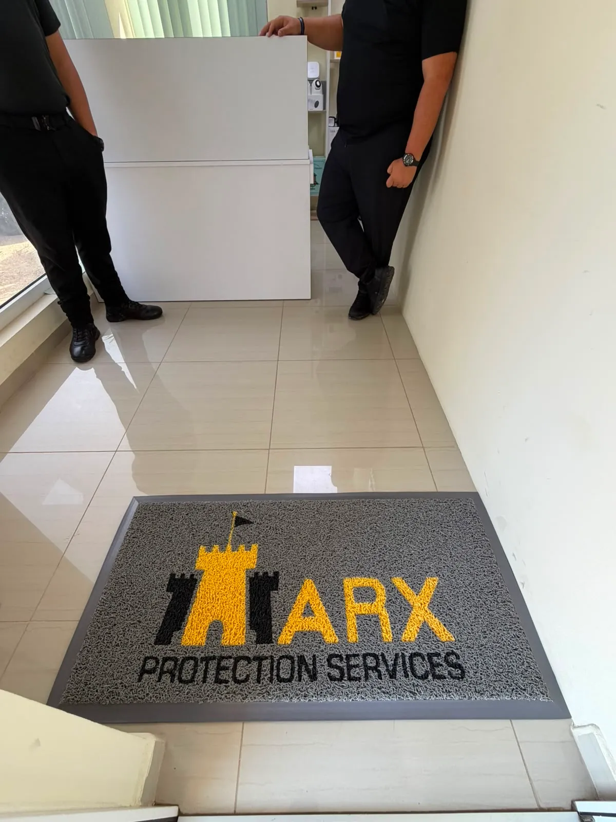 ARX Protection Services custom logo entrance mat in Aruba