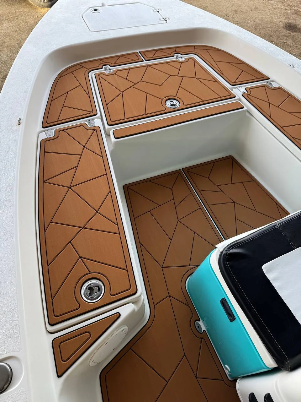 Custom brown teak-look EVA deck with geometric pattern