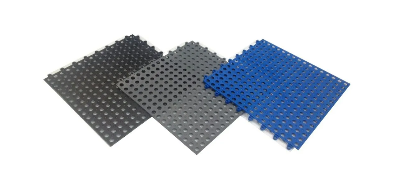 Interlocking anti-slip tiles available in black, grey and blue
